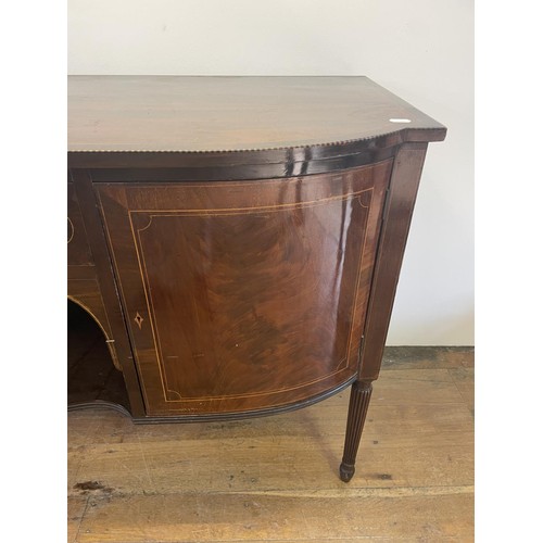 820 - A mahogany sideboard, with a single drawer, flanked by two cupboard doors, on turned reeded legs, 18... 