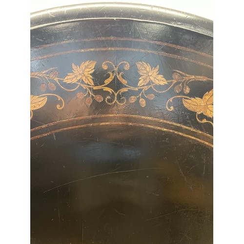 831 - A late 19th century ebonised table, with marquetry decoration