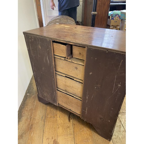 832 - A George III oak chest, having two short and three long drawers, 85 cm wide