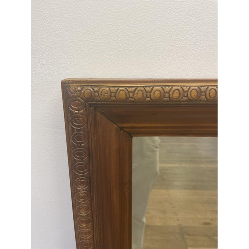 836 - A walnut framed wall mirror, 113 x 92 cm