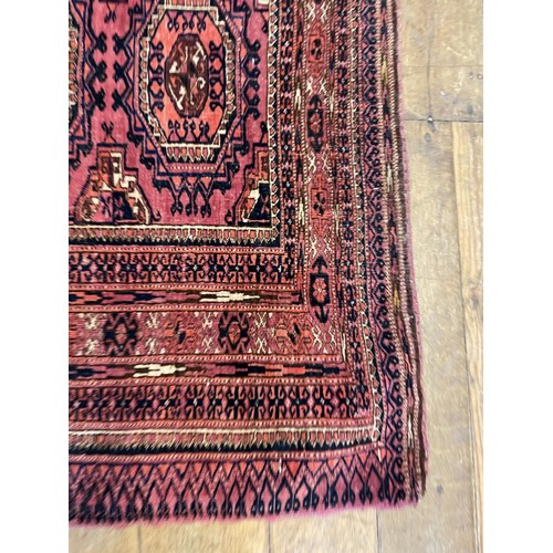 838 - An Afghan red ground rug, 152 x 82 cm and an Art Deco style robe (2)