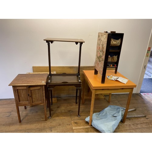 849 - An oak refectory table, 184 cm wide, a kitchen table, a folding sewing box, a cupboard, two tables, ... 