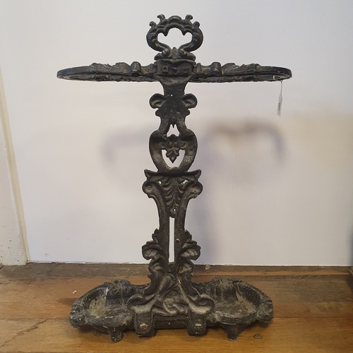 771 - A cast iron stick stand, 64 cm high