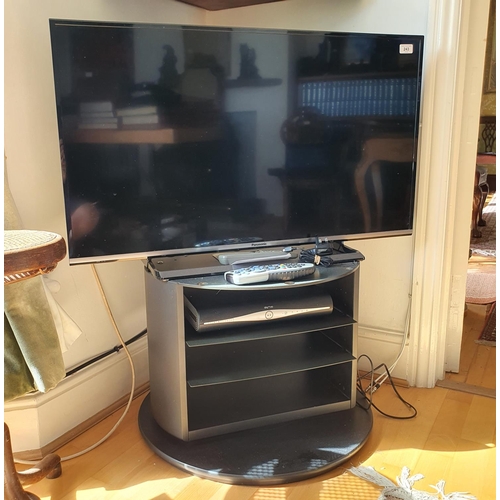 62 - A Panasonic LCD TV TX - 40CS520B, on a stand with a Sky box, PAT tested