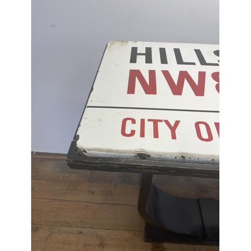 101 - An enamel street sign, Hillside Close NW8, City of Westminster, set into the top of a table, 107 cm ... 