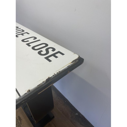 101 - An enamel street sign, Hillside Close NW8, City of Westminster, set into the top of a table, 107 cm ... 