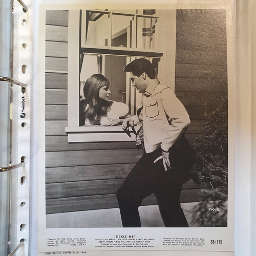 25 - An album of film portrait photographs and lobby cards, to include Bonnie Baker, Dean Martin, Sally B... 