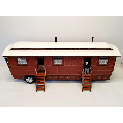 66 - A scratch built model of a fairground living wagon, 127 cm wide  
Provenance: Hand built by the vend... 