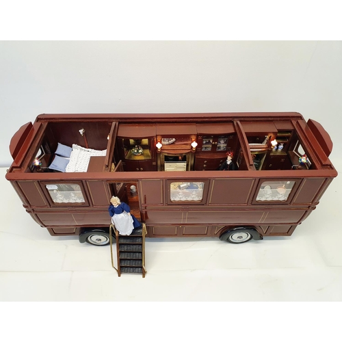 67 - A scratch built model of a fairground living wagon, 100 cm wide
Provenance:  Hand built by the vendo... 