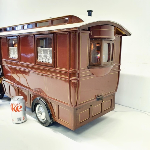 67 - A scratch built model of a fairground living wagon, 100 cm wide
Provenance:  Hand built by the vendo... 