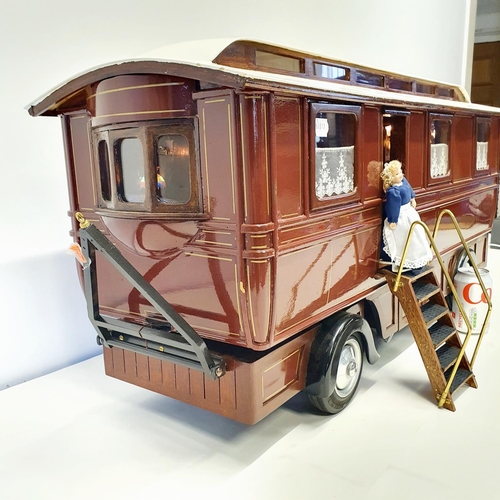 67 - A scratch built model of a fairground living wagon, 100 cm wide
Provenance:  Hand built by the vendo... 