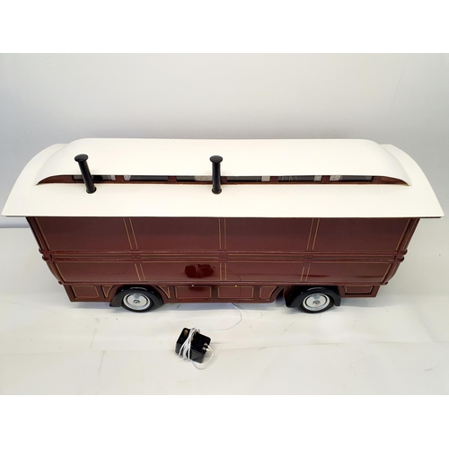 67 - A scratch built model of a fairground living wagon, 100 cm wide
Provenance:  Hand built by the vendo... 