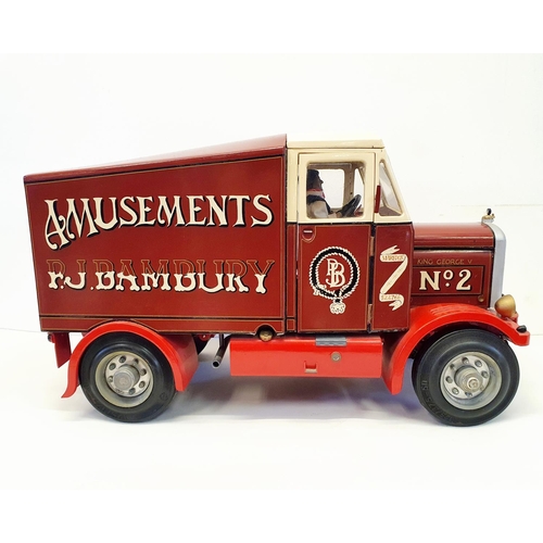 68 - A scratch built model of a Scammell lorry, branded P J Bambury & Son, Amusements, 60 cm wide, and a ... 