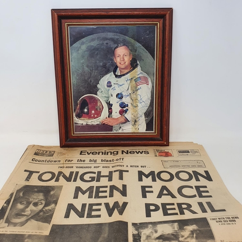 8 - A signed photograph of astronaut Neil Armstrong, inscribed 'To Paul Marsh With Best Wishes Neil Arms... 