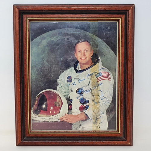 8 - A signed photograph of astronaut Neil Armstrong, inscribed 'To Paul Marsh With Best Wishes Neil Arms... 