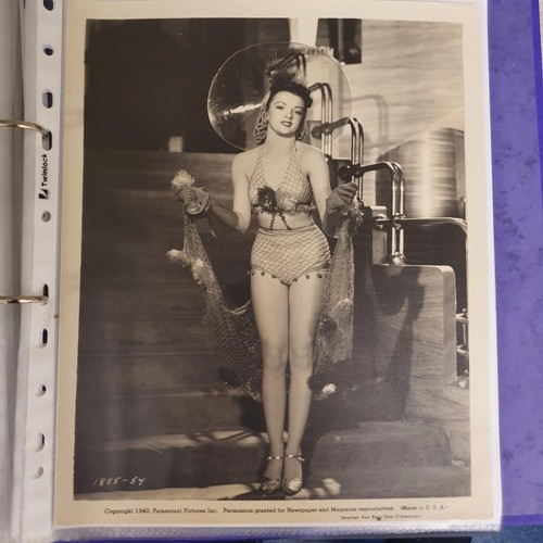 24 - An album of film portrait photographs and lobby cards, to include: An Old Spanish Custom, Alice Talt... 