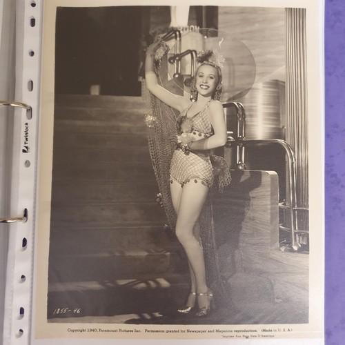 24 - An album of film portrait photographs and lobby cards, to include: An Old Spanish Custom, Alice Talt... 