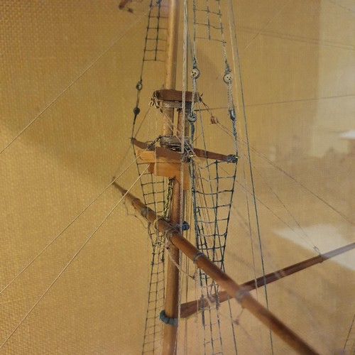 70 - A model of a two masted schooner, in a display case, 103 cm wide 
Provenance:  Hand built by the ven... 