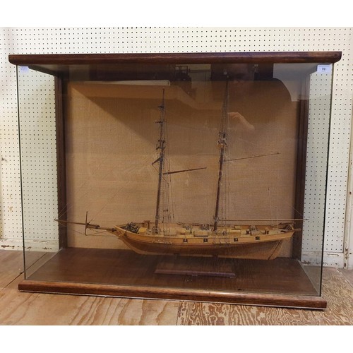 70 - A model of a two masted schooner, in a display case, 103 cm wide 
Provenance:  Hand built by the ven... 