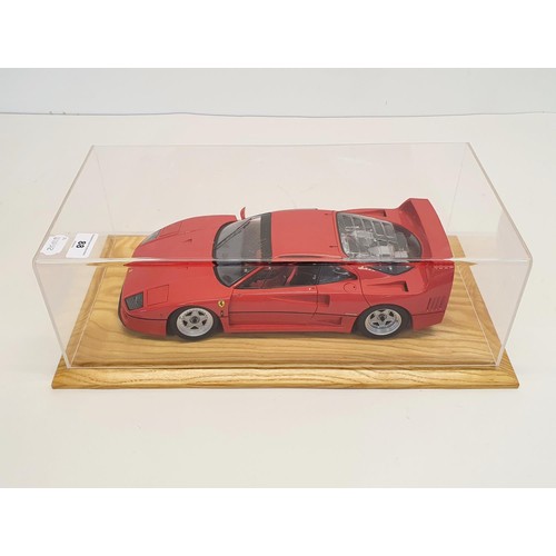 88 - A Kyosho model of a Ferrari F40, in a perspex case