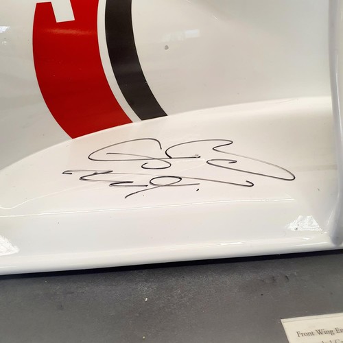 106 - A front wing end panel from Jenson Button's 2009 World Championship winning Formula One car, signed ... 