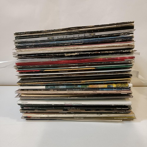 51 - Assorted vinyl LPs to include, T-Rex, Madonna and Fleetwood Mac (box)