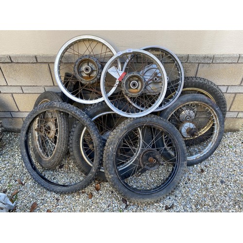 231 - A motorcycle frame, assorted wheels and tyres (qty)