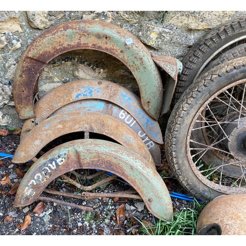 236 - A motorcycle frame, two fuel tanks, assorted mudguards and wheels (qty)