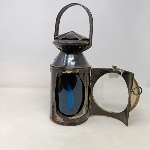 127 - A SWR (South Western Railway) lantern, with plaque reading F Ellacott Guard Waterloo, 34 cm high