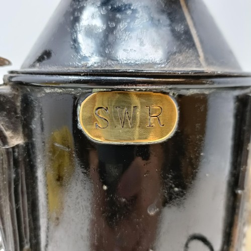 127 - A SWR (South Western Railway) lantern, with plaque reading F Ellacott Guard Waterloo, 34 cm high