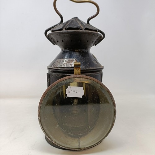 129 - A railway lamp, with plaques reading: Horley Fogmen, embossed 2171 LB & Son, 32 cm high