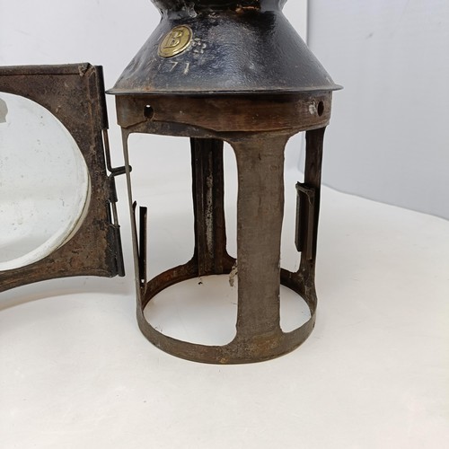 129 - A railway lamp, with plaques reading: Horley Fogmen, embossed 2171 LB & Son, 32 cm high