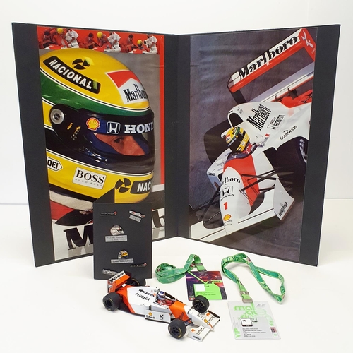 109 - Assorted McLaren automobilia, to include a signed print by Mika Hakkinen, a model of a McLaren Peuge... 