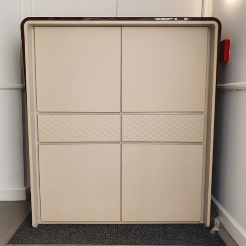 133 - A Bentley Home Eastgate cocktail cabinet, in burr walnut and cream leather, comprising two cupboard ... 