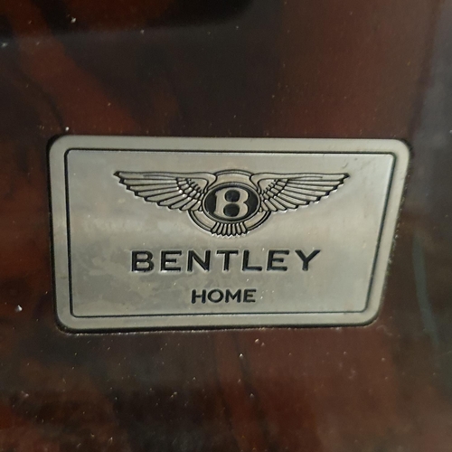 133 - A Bentley Home Eastgate cocktail cabinet, in burr walnut and cream leather, comprising two cupboard ... 