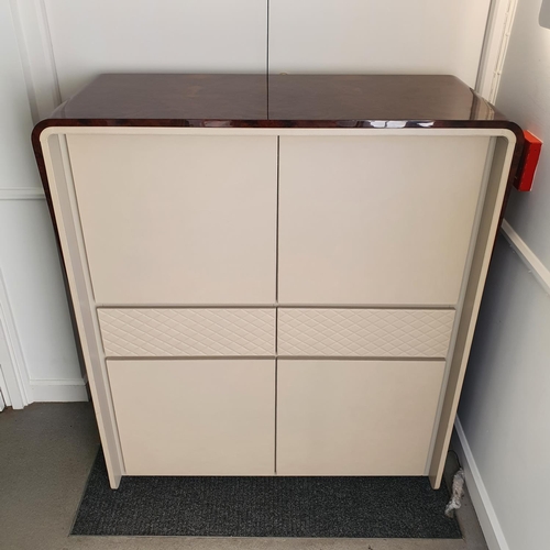 133 - A Bentley Home Eastgate cocktail cabinet, in burr walnut and cream leather, comprising two cupboard ... 