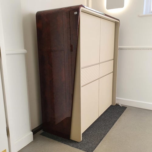 133 - A Bentley Home Eastgate cocktail cabinet, in burr walnut and cream leather, comprising two cupboard ... 