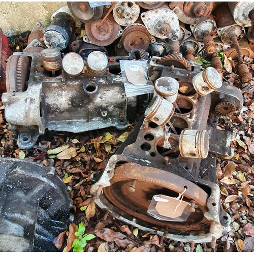 248 - A large group of starter motors, and three engines (parts only) (qty)  
Provenance: Removed from a p... 