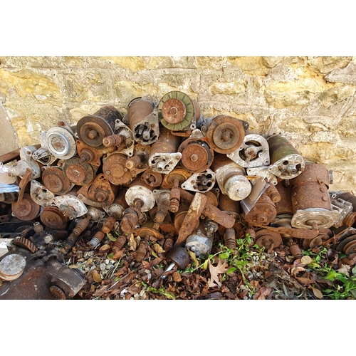 248 - A large group of starter motors, and three engines (parts only) (qty)  
Provenance: Removed from a p... 