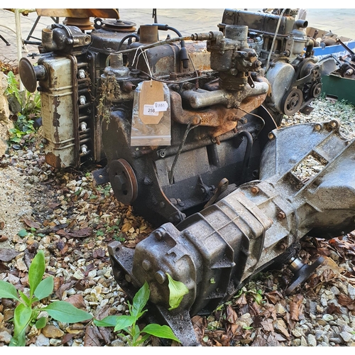 256 - Two Reliant engines, and a gearbox (3) 
Provenance: Removed from a private garage/workshop in Oxford... 