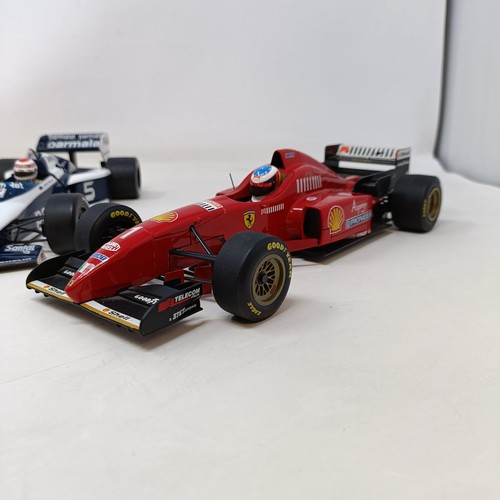 94 - A Grand Prix model of Michael Schumacher's Ferrari F1 Car, and two others (3)