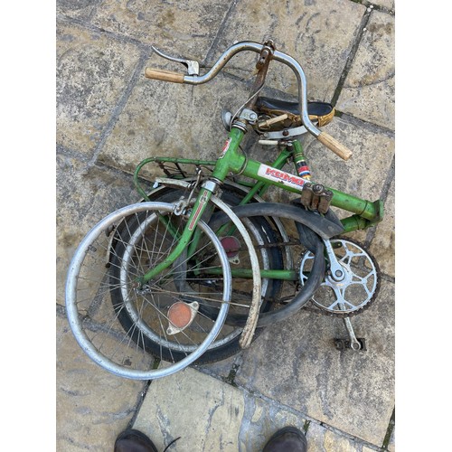 227 - A Kama green painted folding bicycle  
Provenance: Removed from a private garage/workshop in Oxfords... 