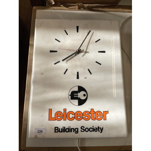 226 - A Leicester Building Society office plastic clock, 40 cm high 
Provenance: Removed from a private ga... 