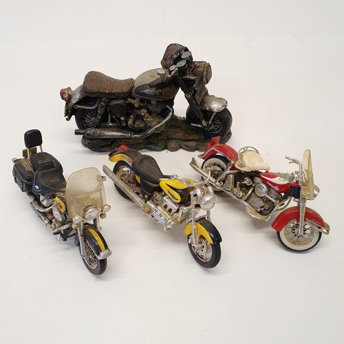 151 - A tinplate motorcycle with rider, other similar items and a Pirelli 1988 calendar (box)