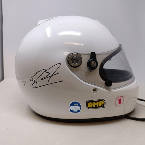 104 - An Arai Motor Racing helmet, signed by Michael Schumacher and Jean Alessi, dated 2003