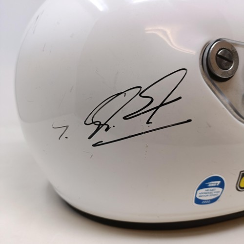 104 - An Arai Motor Racing helmet, signed by Michael Schumacher and Jean Alessi, dated 2003