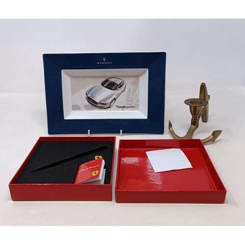 99 - A Tiffany & Co silver Heads and Tails Coin, a Ferrari cap, a set of Ferrari Car Colour Pencils, a Ma... 