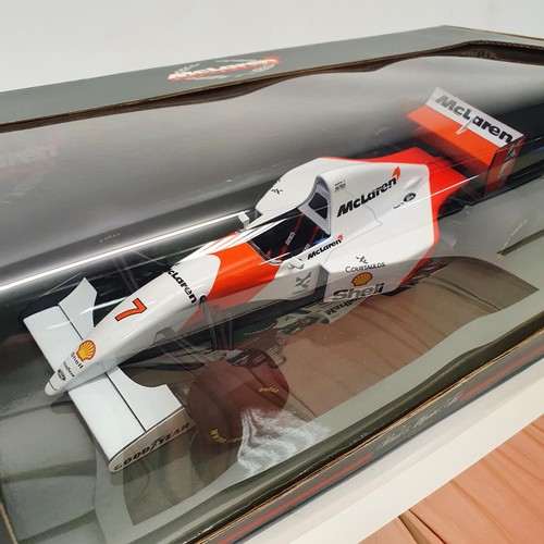 115 - A Paul's Model Art 1:18 scale model of a McLaren MP4/11, driven by Mika Hakkinen, boxed, and a photo... 