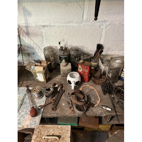 53 - The workshop and other items, removed from John Pearson's garage, including tools, a work bench, and... 