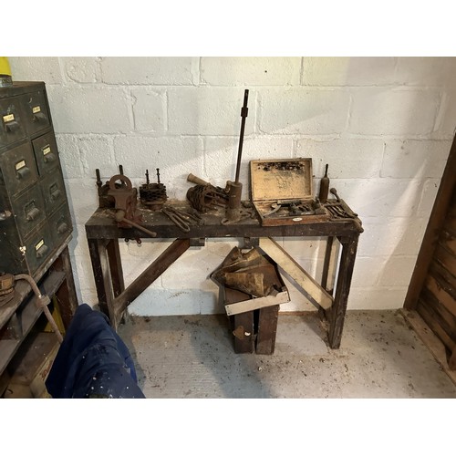 53 - The workshop and other items, removed from John Pearson's garage, including tools, a work bench, and... 